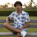 Model wearing the Kaimana Hana Palm Hawaiian shirt